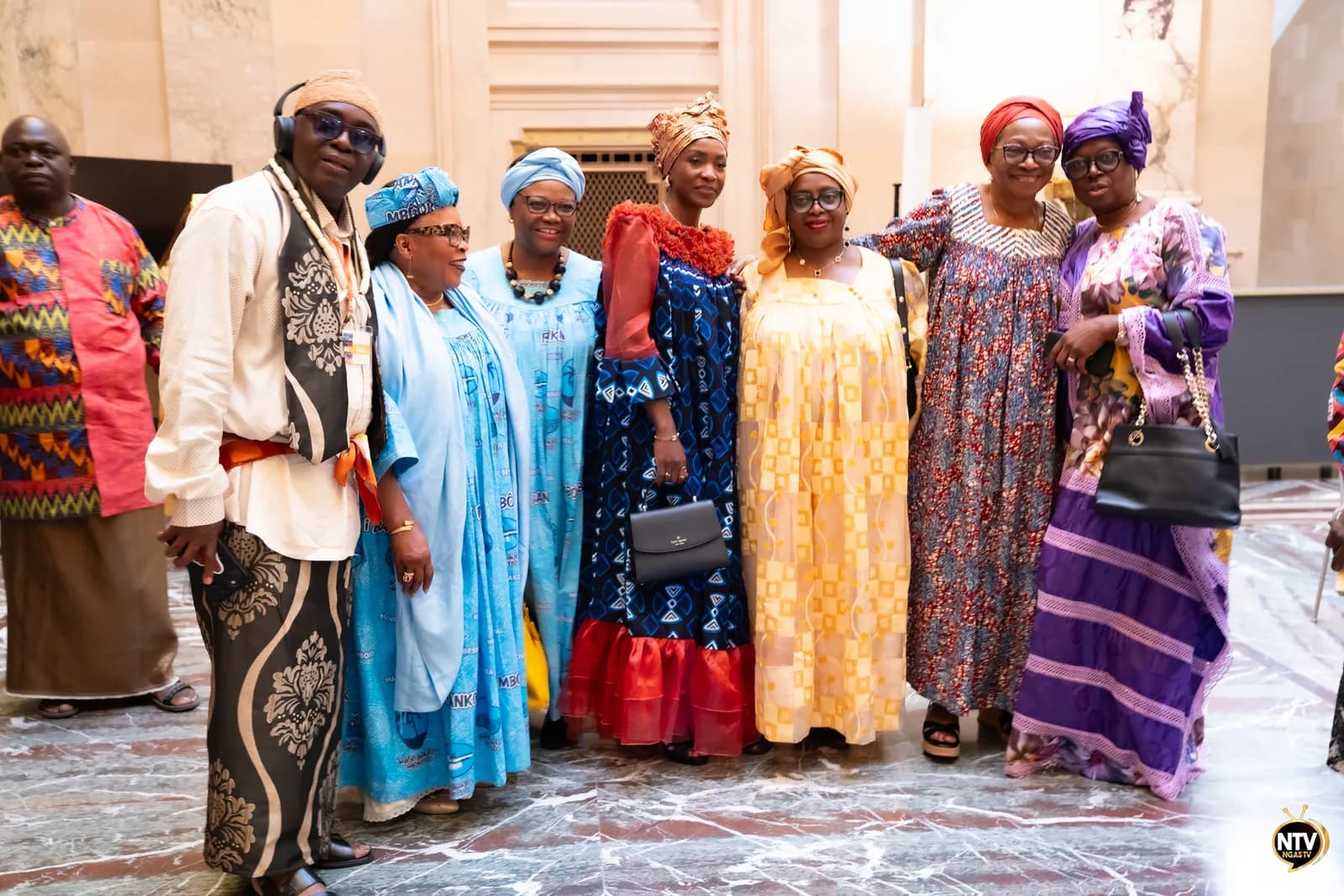 Members of the Sawa community gathered and smiling at City Hall during the 2025 Convention.